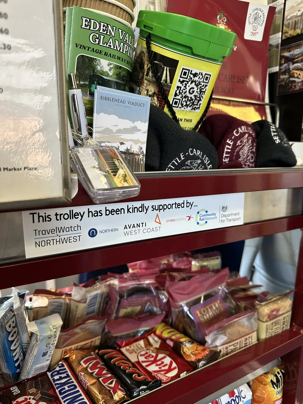 refereshment trolley fillwd with sweets and chocolate