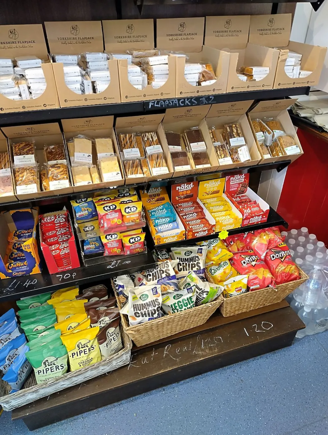 A shop display of sweet and savoury snacks