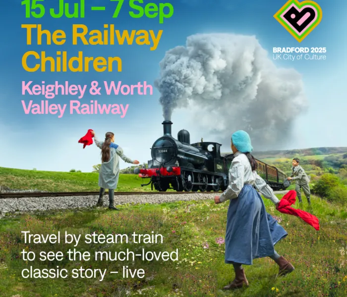 Steam train and children with red flags. Railway Children