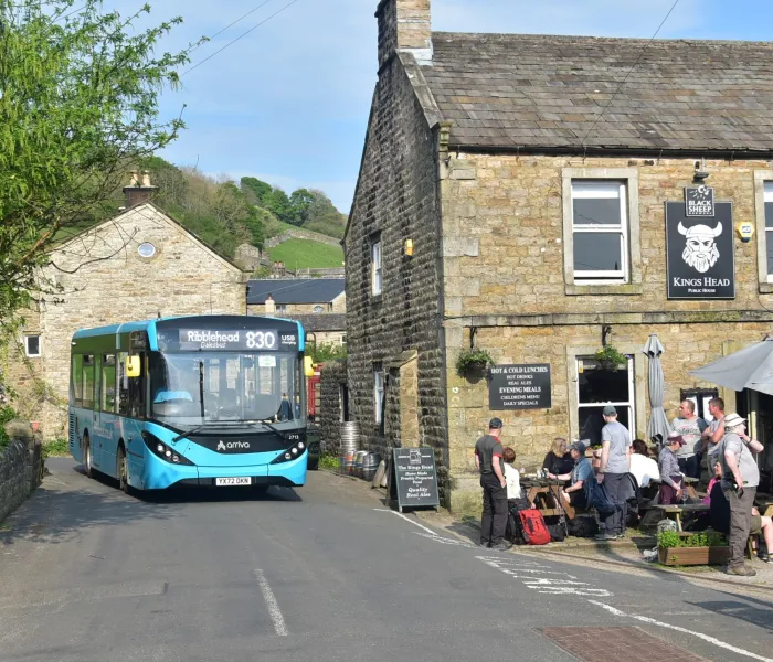 The 830 Northern DalesBus at Gunnerside on its way to Ribblehead.