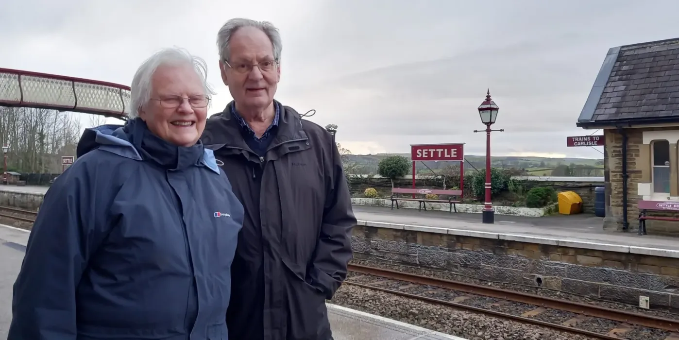 Wendy and Ernest stood at Settle Station